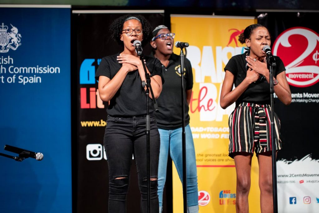 Ifeyi Iton, left, Chole Elwin and Deja Lewis of St George’s College, of Tenth Street and Sixth Avenue in Barataria, onstage at Raise The Bar at the Central Bank Auditorium in Port of Spain.