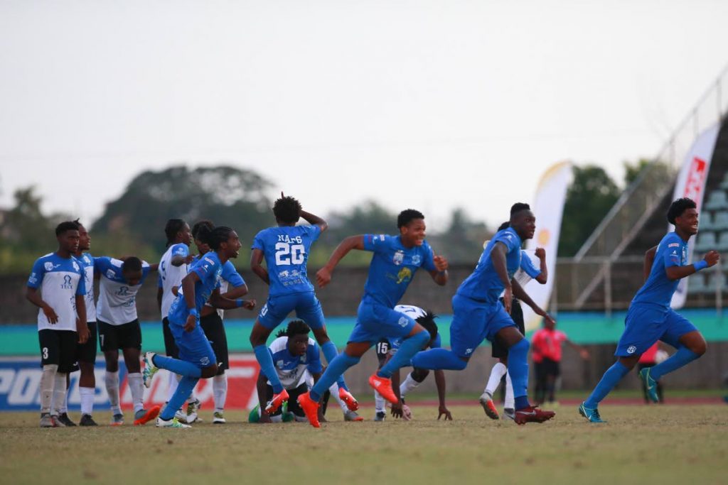 Naps players celebrate their penalty shootout victory over Presentation College in the Coca Cola Intercol South Zone final at the Manny Ramjohn Stadium, Marabella, Monday. 