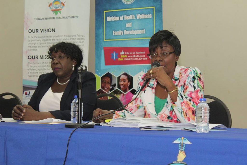 Health Secretary Agatha Carrington, right, responds to concerns from villagers at a community meeting at the Betsy’s Hope/Louis D’or Multipurpose facility hosted by the Division of Health and the Tobago Regional Health Authority (TRHA) last Wednesday. At left is Ingrid Melville, Chairman, TRHA.
