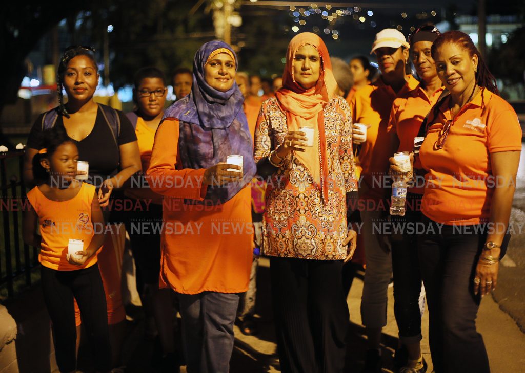 The Rape crisis  society hosted its annual candlelight vigil and silent walk around Memorial park PoS
PHOTO BY AZLAN MOHAMMED
Sunday, 25th November, 2018