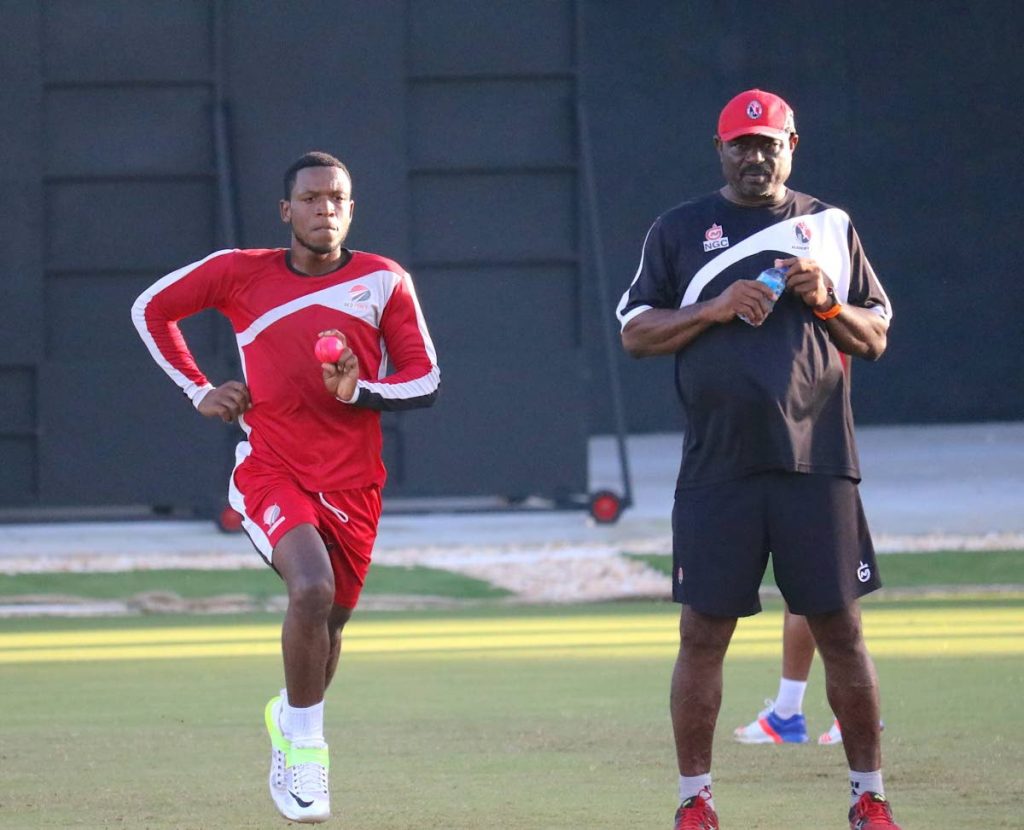 FLASHBACK: National coach Kelvin Williams, right, looks on as pacer Daniel St Clair, left, bowls during a training session. 