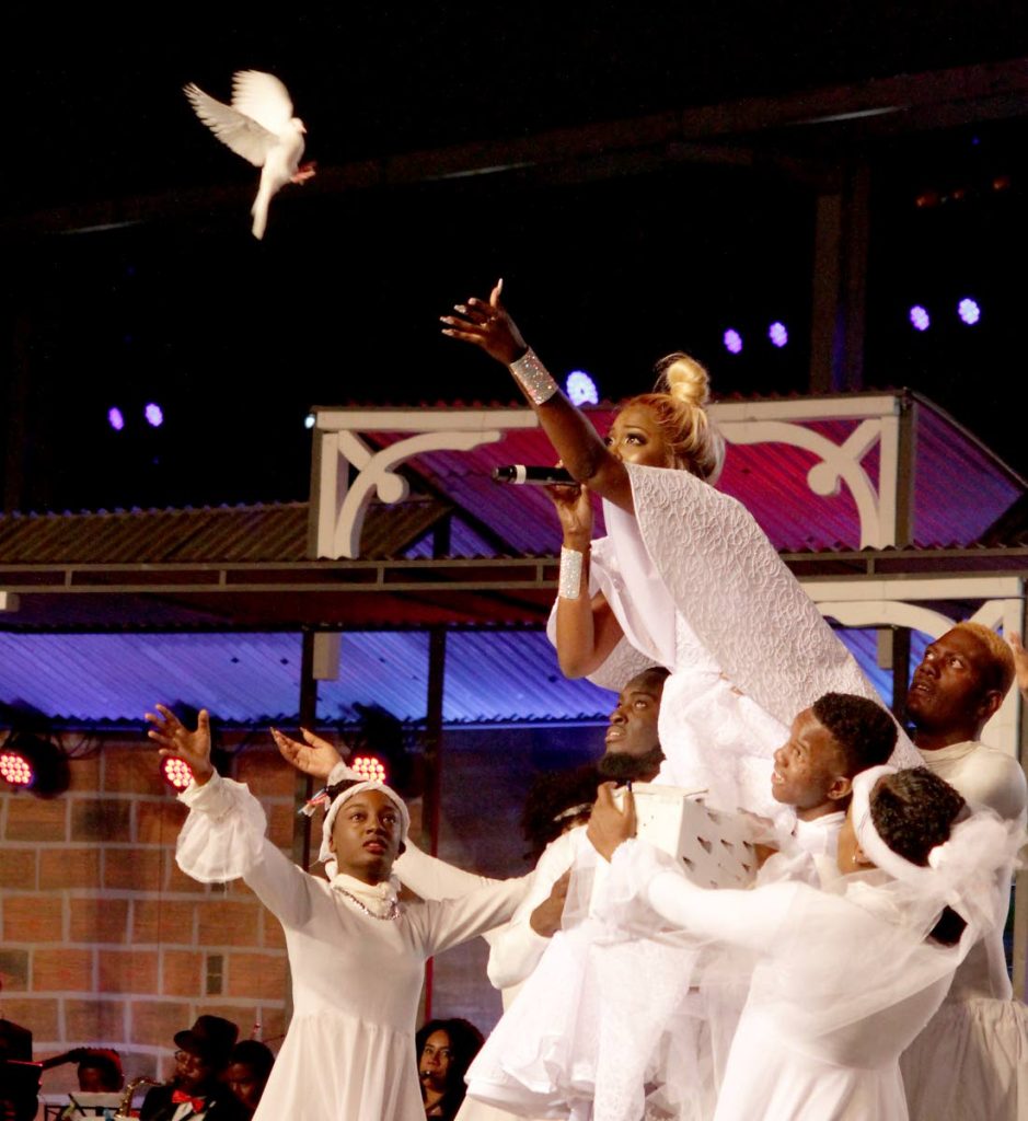 Karene Asche releases a dove during her performance at the Calypso Monarch final of the Dimanche Gras, Queen's Park Savannah, Port of Spain on February 12, 2018. The calypso and King and Queen of Carnival finals would no longer be part of Dimache Gras which would be a Carnival showcase produced by the NCC. FILE PHOTO