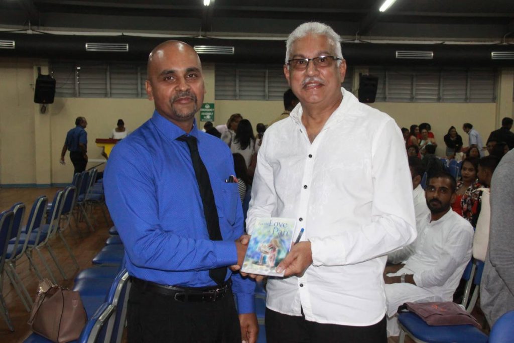 Dr Prithiviraj Bahadursingh, author of For The Love of Pan, and Minister of Health Terrence Deyalsingh at the November 25 book launch at the Naparima Girls’ High School.