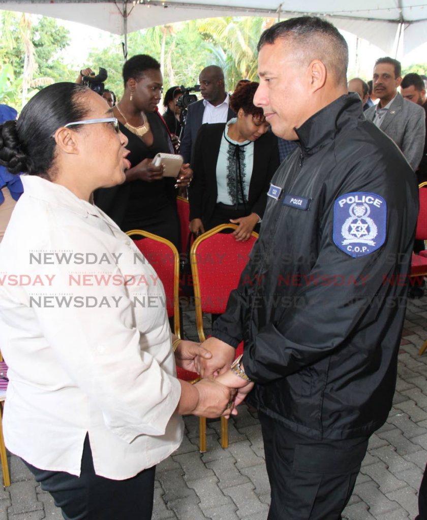 Gary Griffith, Commissioner of Police greets Joanne James, President of the Police Wife's Association at the offical launch of the 'I Support Our Service' campaign at the residence of the Commissioner of Police, Police Barracks St James. December 2, 2018. PHOTO BY ROGER JACOB. 