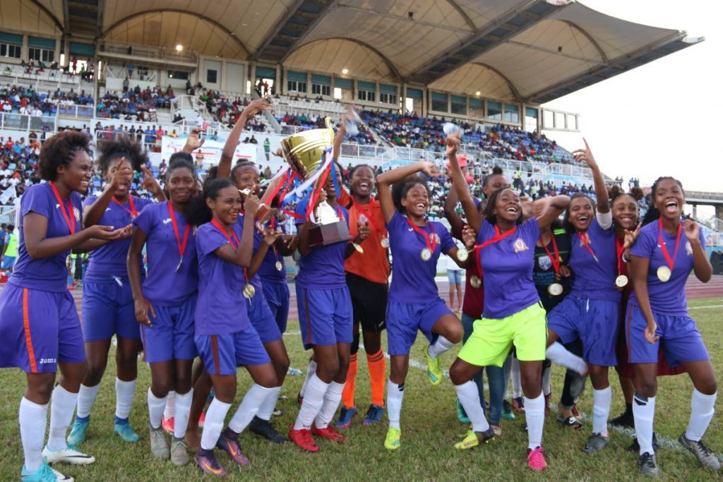 Pleasantville Secondary players celebrate their 3-0 win against Signal Hill Secondary, at the National Intercol final yesterday, as they took home the SSFL title, at Ato Boldon Stadium