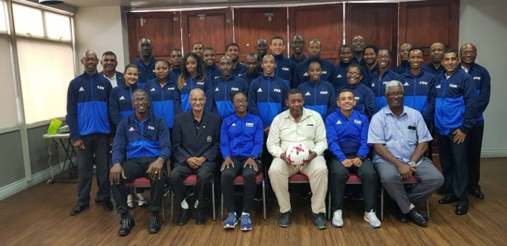 TTFA president David John-Williams, seated centre, with FIFA and local course administrators as well as participants of last week's FIFA Referee Assistance Programme, VIP Lounge, Hasely Crawford Stadium, Mucurapo. 