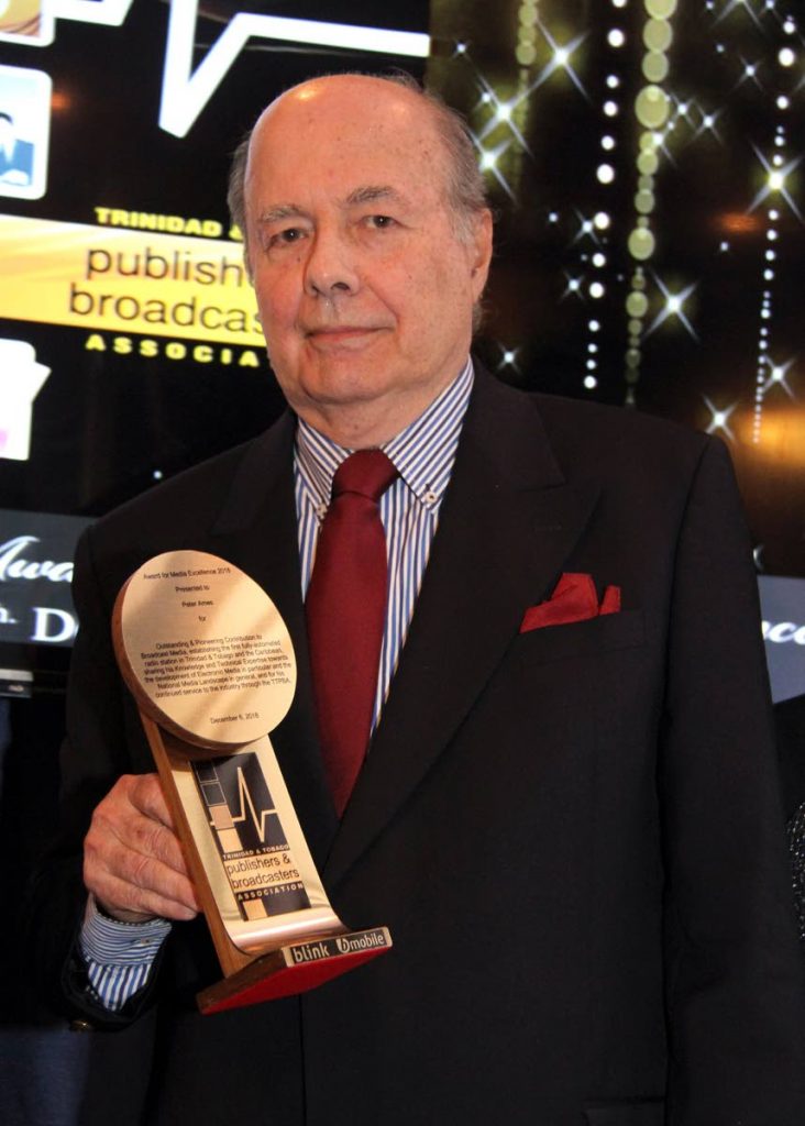 Peter Ames with his award for media excellence from the Trinidad and Tobago Publishers and Broadcasters Association (TTPBA) annual awards ceremony. PHOTOS BY SUREASH CHOLAI