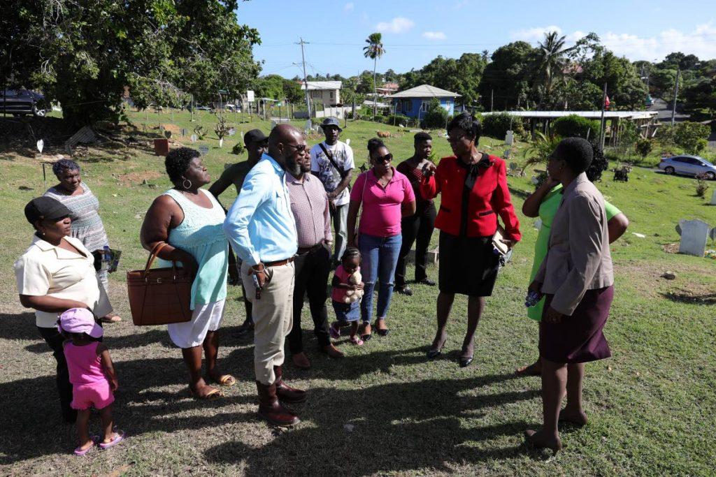 Health Secretary Dr Agatha Carrington, third from right, holds discussions on upgrade works at the Plymouth public cemetery at the construction site on Monday. THA Photo