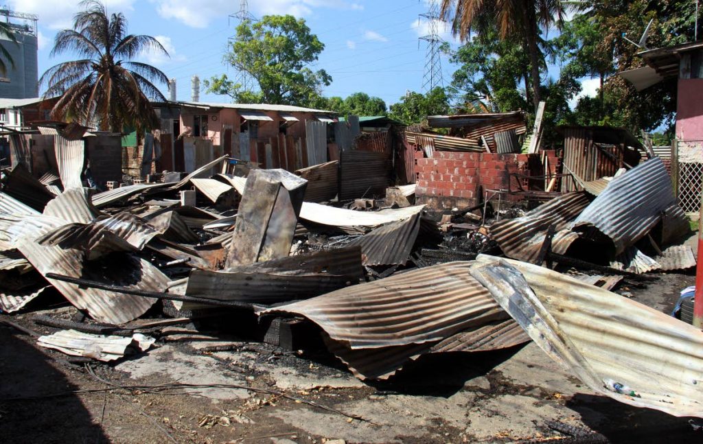 The scene after five homes was destroyed by fire at Concern Citizens Street, Callifornia.
PHOTO BY ANIL RAMPERSAD.