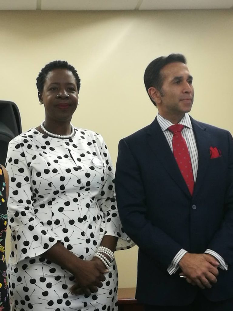 Onika Mars and Attorney General Faris Al-Rawi at a recent panel discussion on strengthening the legal response to domestic violence.