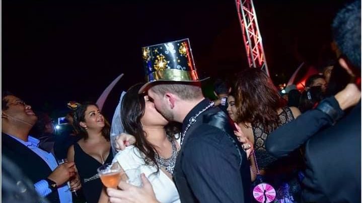 A couple kiss to the New Year at Jamboree’s past New Year’s Eve party. Photo courtesy the Jamboree committee.