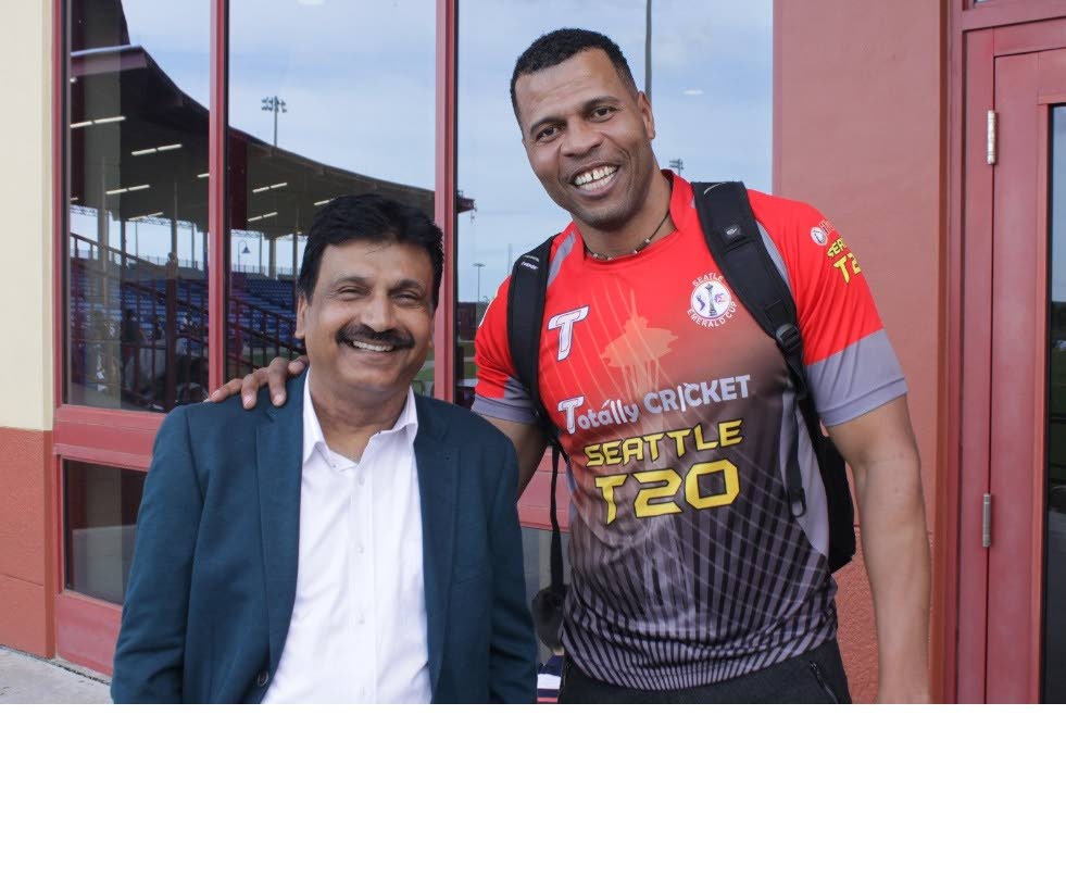Former West Indies pacer Mervyn Dillon, right, with sports journalist Mirza Iqbal Baig at the Central Broward Regional Park, Lauderhill, Florida.