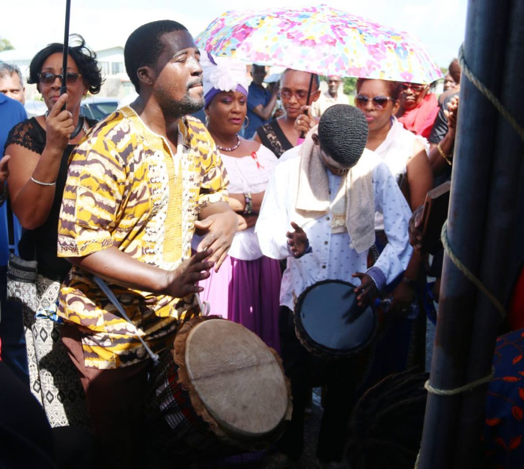 Drummers perform at the funeral of former councillor and community activist Jimmy Edwards at Mayaro Recreation Grounds, Mayaro yesterday. PHOTO BY ANSEL JEBODH