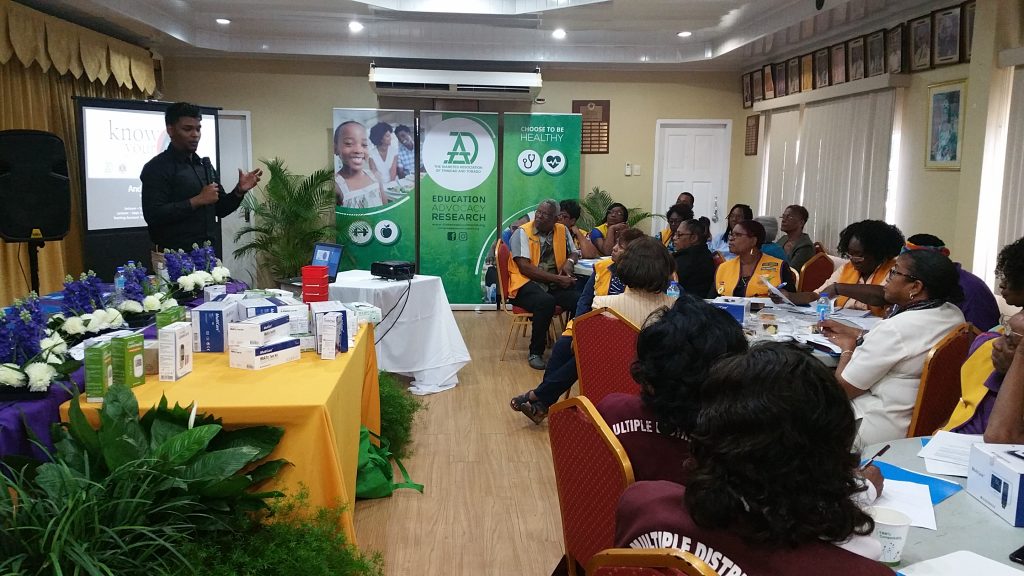 Diabetes  Association TT (DATT) president, Andrew  Dhanoo speaking to members of  the Lions Cultural Center and DATT at the launch of 