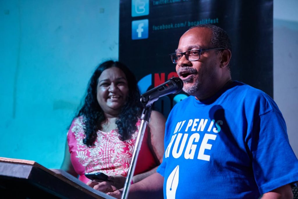 Poet Shivanee Ramlochan laughs as author Colin Robinson address the audience at Backchat: Port of Spain at the  Euphoria Lounge. PHOTO COURTESY BOCAS LIT FEST