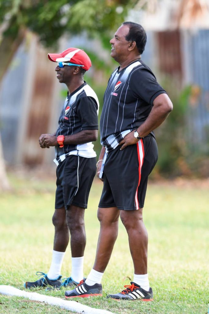 Red Force manager Roland Sampath, right, is not blaming Windwards bowler Shane Shillingford's illegal bowling action for their opening loss. 