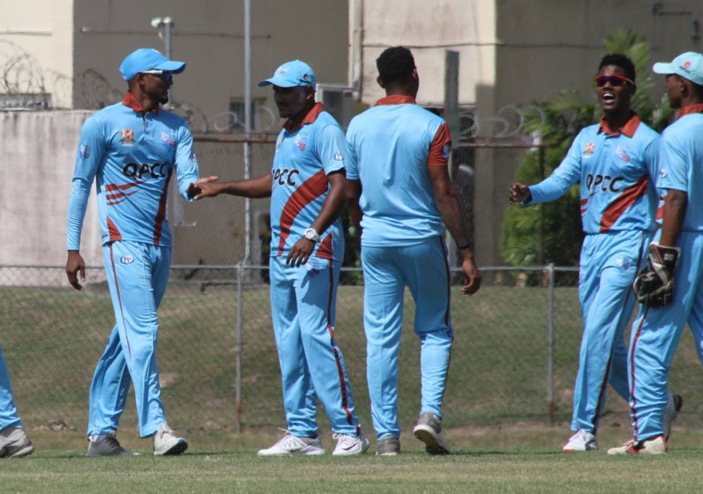 Queen’s Park players celebrate a wicket against Endeavour in the UWI-UNICOM T20 Tournament yesterday. PHOTO BY ROGER JACOB