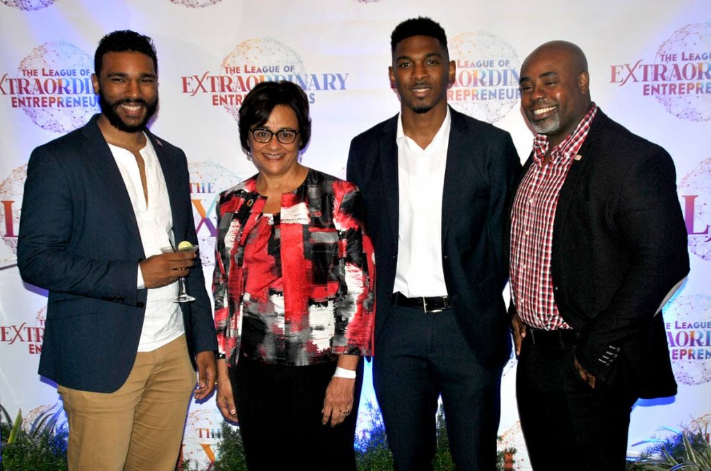 President of the League of Extraordinary Entrepreneurs (LXE), Jaysen Francis (second from right), enjoy a celebratory moment at the launch of the organisation with (from left) Darrion Narine, Vice Chair, Inclusion and Engagement, Commonwealth Youth Council; life coach Dale Laughlin; and businessman Kerry Grant. 