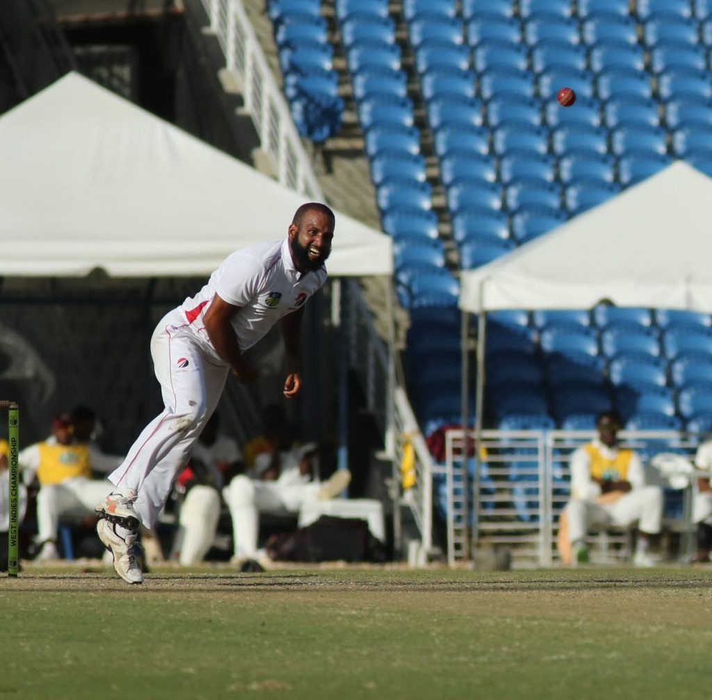 Red Force spinner Yannic Cariah sends down a delivery against the Leewards at the Brian Lara Academy, Tarouba, yesterday.