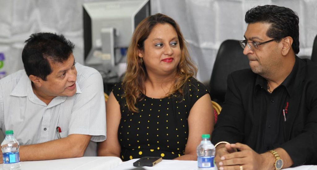 Opposition MPs Dr Lackram Bodoe, Ramona Ramdial and Rushton Paray at a press conference in Couva last year. Bodoe yesterday advised pregnant women to get the H1N1 vaccine. FILE PHOTO