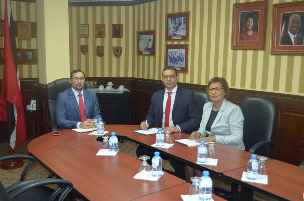 Tourism Minister Randall Mitchell meets with National Security Minister Stuart Young and Parliamentary Secretary in the Ministry of National Security Glenda Jennings-Smith. Photo courtesy Ministry of Tourism.