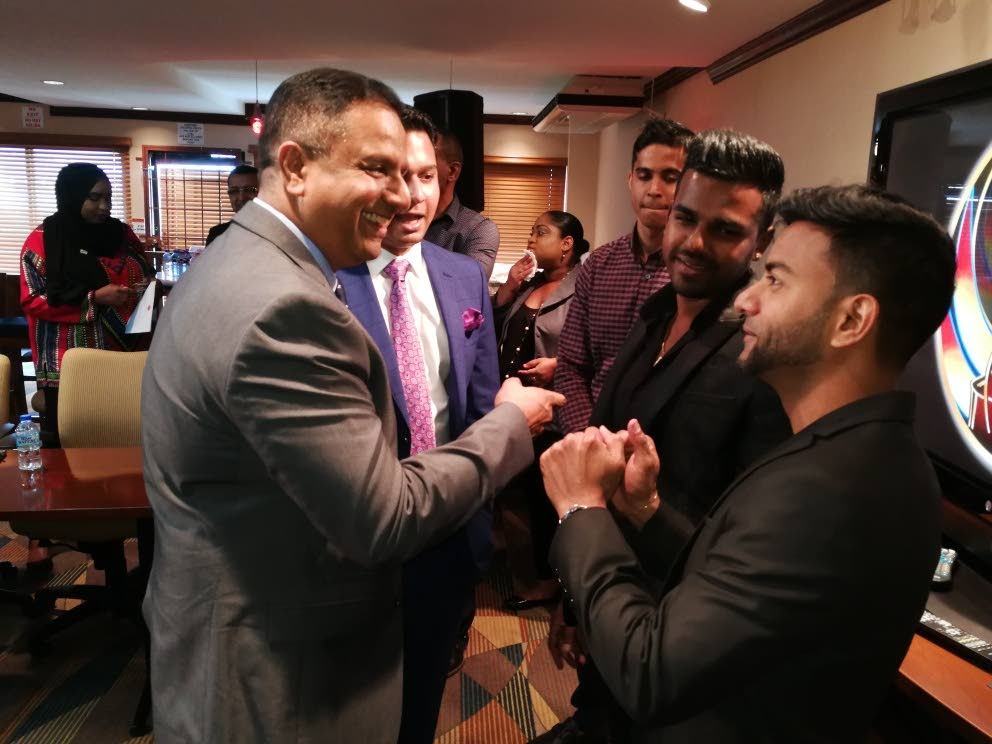  Southex CEO George Singh, left, shares a joke with Rajkavir Singh, Southex director and defending Chutney Soca Monarchs Nishard “Nishard M” Mayrhoo and Neval Chatelal at the NLCB Corporate Box, Queen’s Park Oval, Woodbrook. PHOTO BY JOAN RAMPERSAD