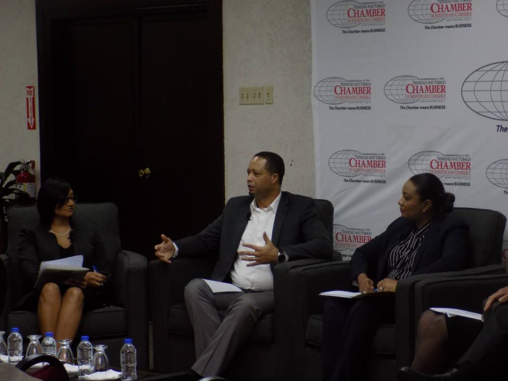 Manager of the Trade and Business Development Unit of the TT Chamber of Industry and Commerce Rianna Paul, left, CEO of the Guyana Office for Investment Owen Verwey, and Legal Services Leader of PricewaterhouseCoopers Angelique Bart participate in a panel discussion at the chamber's Westmoorings building yesterday