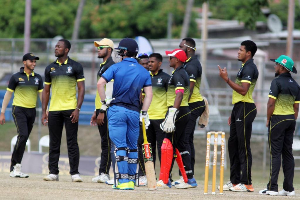 UWI players wait on an umpiring decision against Oxford in their World Universities T20 match at the Sir Frank Worrell Ground, St Augustine, yesterday. PHOTO BY SUREASH CHOLAI 