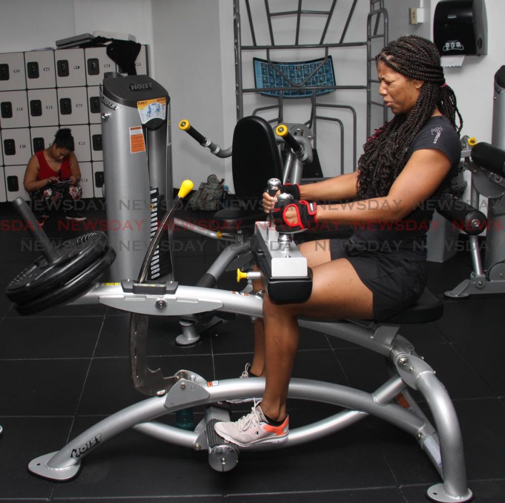 Sherainne Taylor feels the burn from this workout at D Dial Fitness Club, Long Circular Mall, St James.