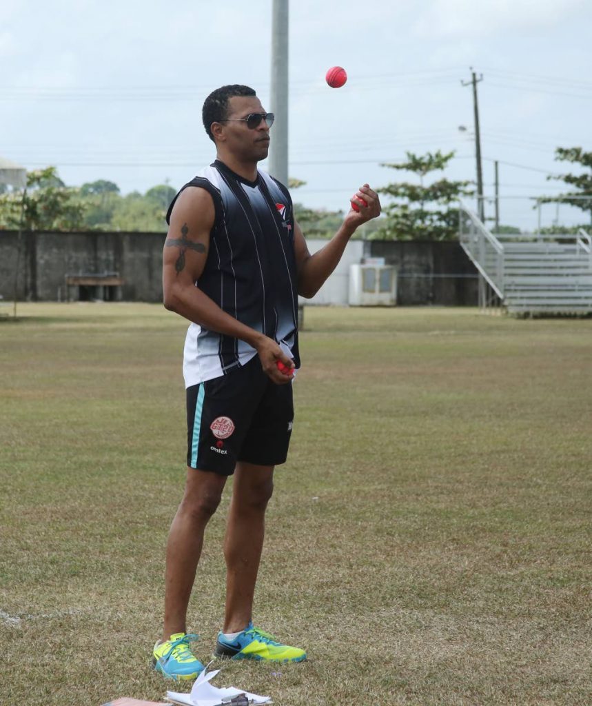 Mervyn Dillon observes a Red Force training session at the National Cricket Centre, Balmain, Couva last week.