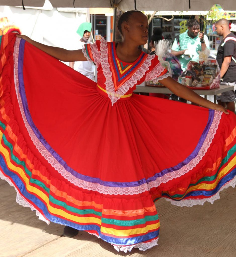 Oneca Bailey of Moruga Secondary School performs a dance at the launch of Princes Town Carnival on Friday.