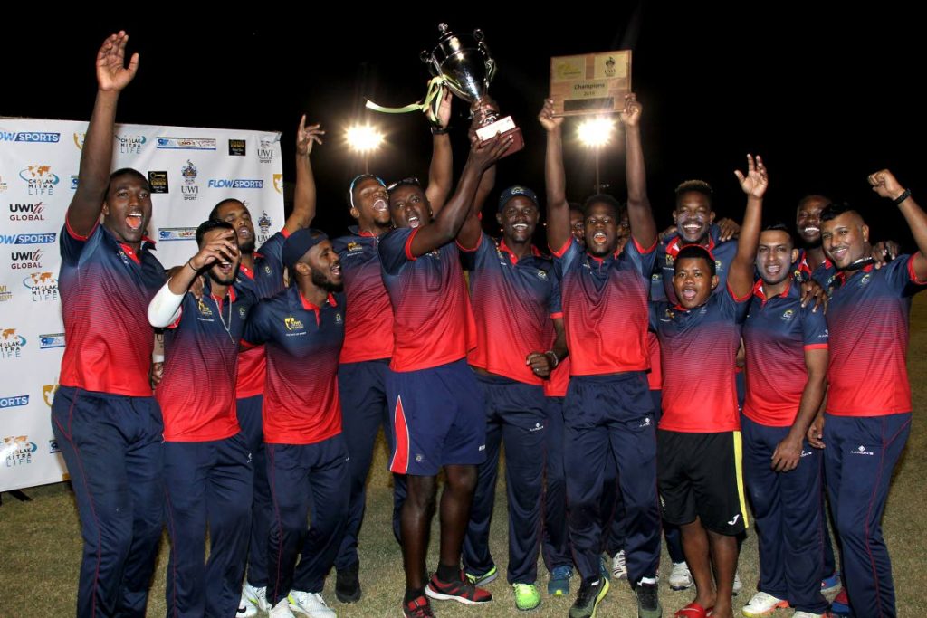 Combined Campuses and Colleges players celebrate victory in the UWI World Universities T20 final yesterday at the Sir Frank Worrell Ground, St Augustine. PHOTO BY ROGER JACOB 