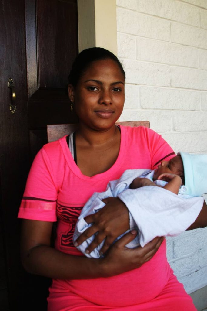 ALL'S WELL: Simone Chadee with her newborn daughter. 