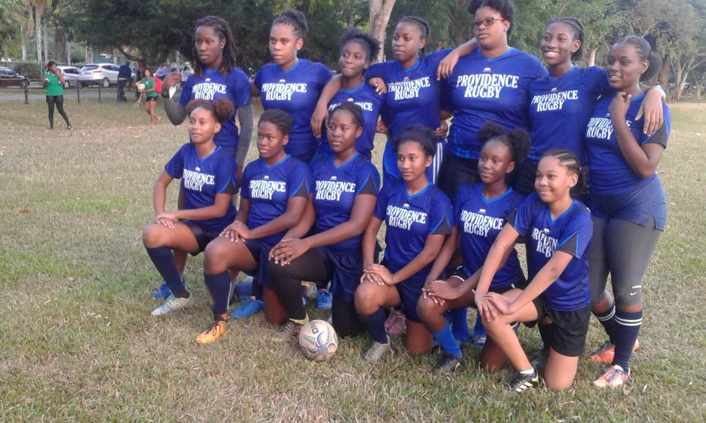 Members of the Providence Girls rugby team, after their 40-0 hammering of Bishop’s Centenary I yesterday at the Queen’s Park Savannah, Port of Spain.