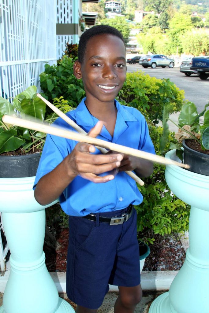 Drumming is “a way to express myself,” says Joaquinn Headley as he flicks his drum sticks. PHOTO BY ROGER JACOB