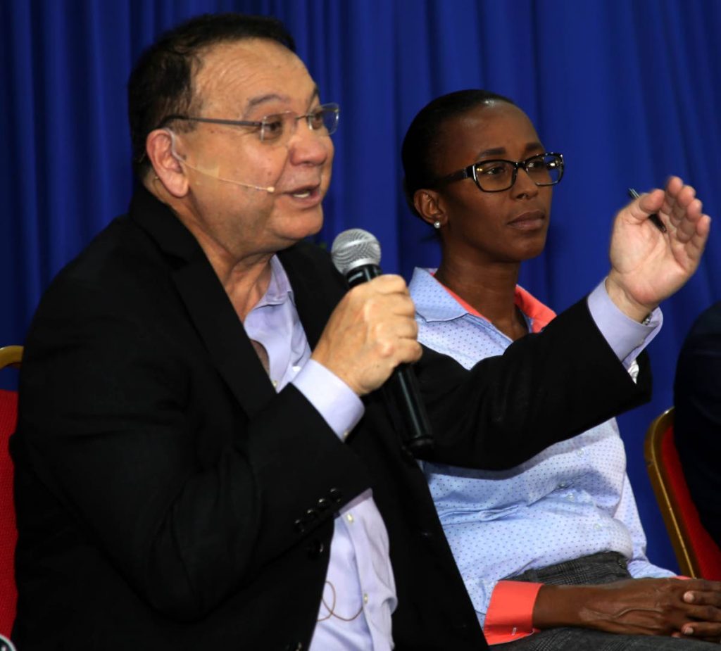Minister of Energy Franklyn Khan responds to the audience as MP for La Brea Nicole Ollivierre listens during a “Conversations with the Prime Minster” event in Palo Seco on Thursday night.