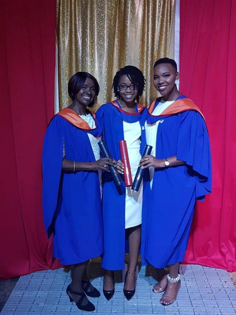 Judith Chase, left, with her daughters, Sonja and Siobhan Chase, right, at their October 2018 graduation from the University of the West Indies. All three graduated on the same day from the same faculty, Social Sciences.