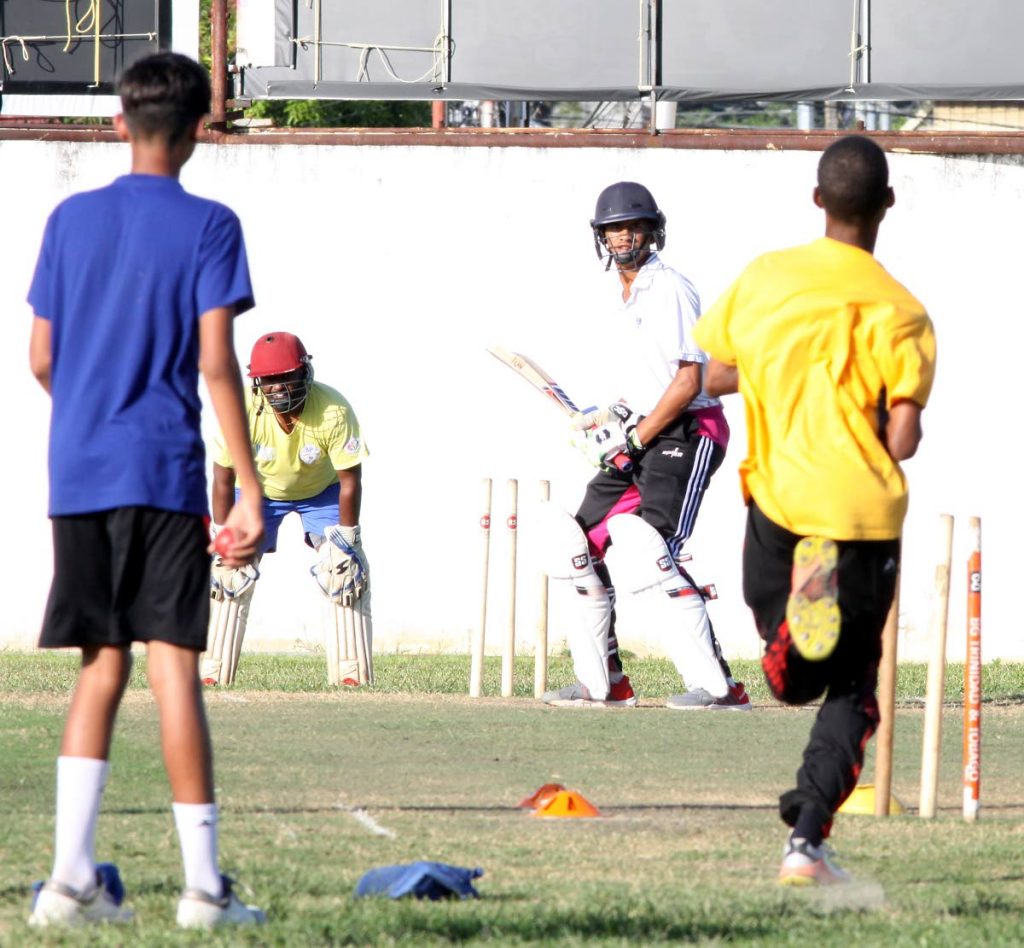 Members of the Fatima College senior cricket team during a training session at Fatima Grounds, Mucurapo, on Friday.