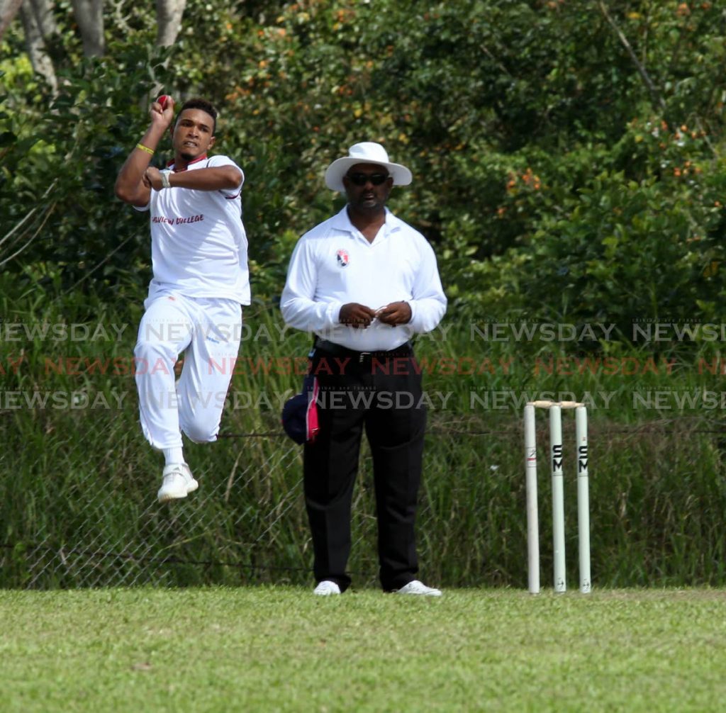 Hillview pacer Jean-Phillip Barry sends down a delivery against St Benedict's College at the Daren Ganga Recreation Ground in Barrackpore yesterday. PHOTO BY VASHTI SINGH 