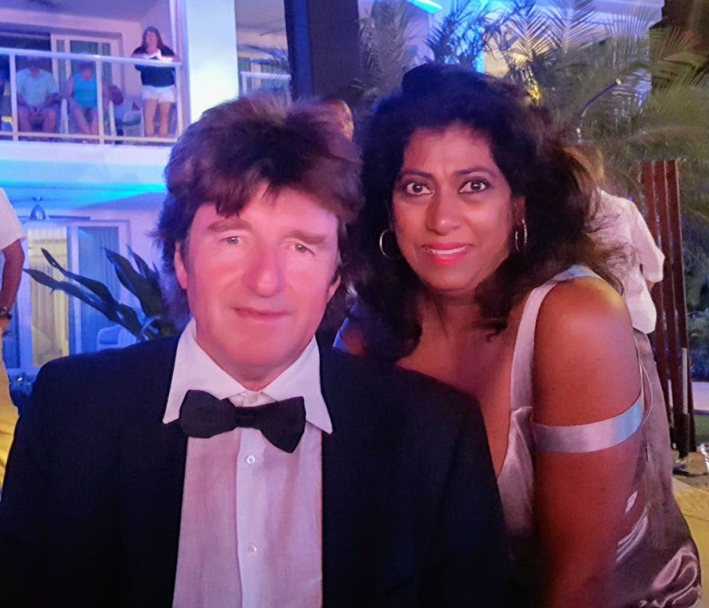 WORLD CLASS: Blue Haven hotel owner Karl Pilstl and his wife Marilyn at the 2019 World Tourism Awards at the Montego Bay Sandals resort in Jamaica on Monday. Blue Haven won an award for being Tobago's leading hotel. PHOTO BY KEINO SWAMBER