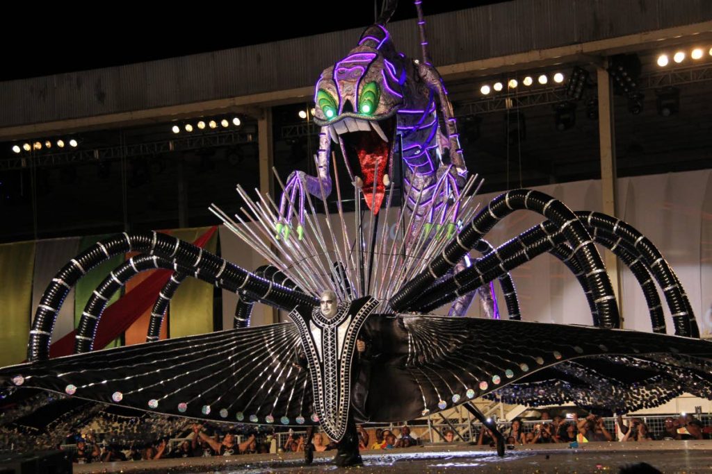 In this February 21, 2017 file photo masquerader Ted Eustace portrays Cryto-Lord of the Galaxy at the King of Carnival finals, Queen's Park Savannah. Eustace was crowned Carnival King that year. The TT Copyright Organisation says king and queen portrayals can be protected by the body as works of mas.