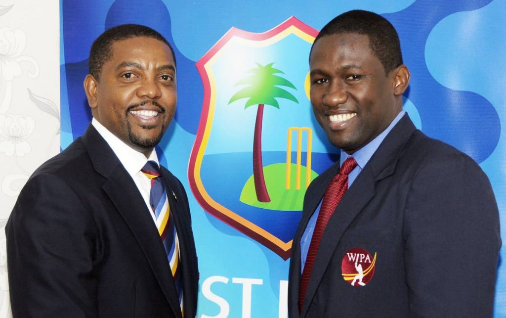 West Indies Players Association (WIPA) president Wavell Hinds, right, with Cricket West Indies head Dave Cameron. 