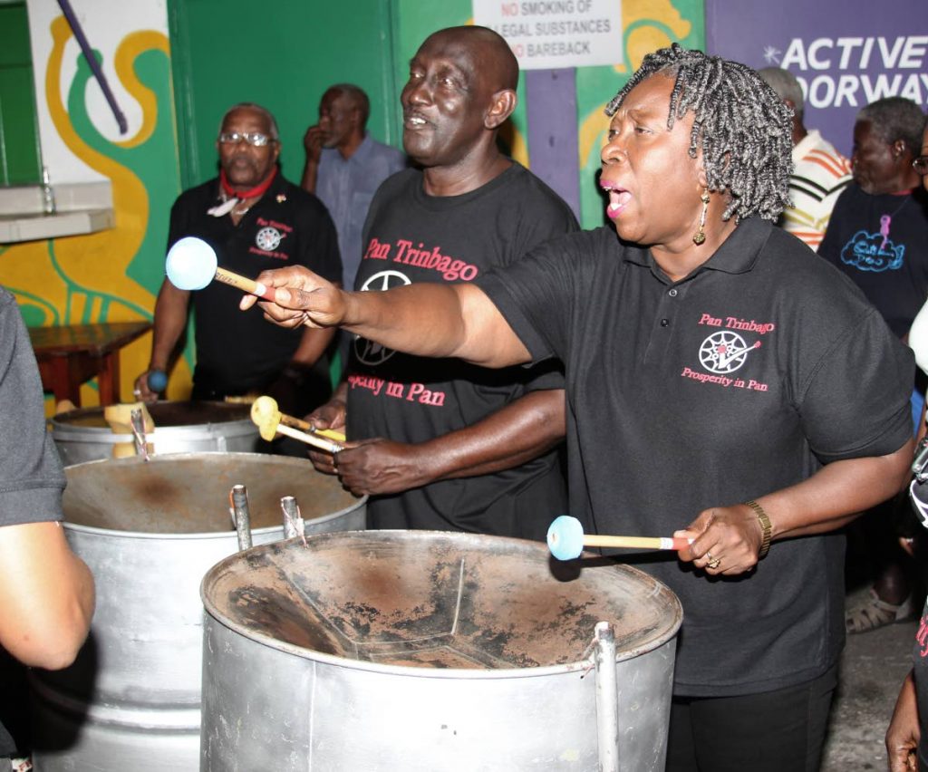 Pan Trinbago president Beverley Ramsey-Moore performs with the organisation's executive steelband at the launch of Panorama 2019 in BP Renegades panyard in Port of Spain on January 19. FILE PHOTO