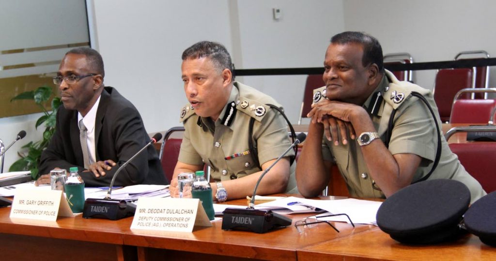 Police Commissioner Gary Griffith, centre, and acting deputy commissioners Harold Phillip, left, and Deodat Dulalchan appear before the Joint Select Committee on National Security on Wednesday. Government yesterday announced the search for a deputy police commissioner has to start over after the merit list, which included Phillip and Dulalchan, expired last month. PHOTO BY SUREASH CHOLAI