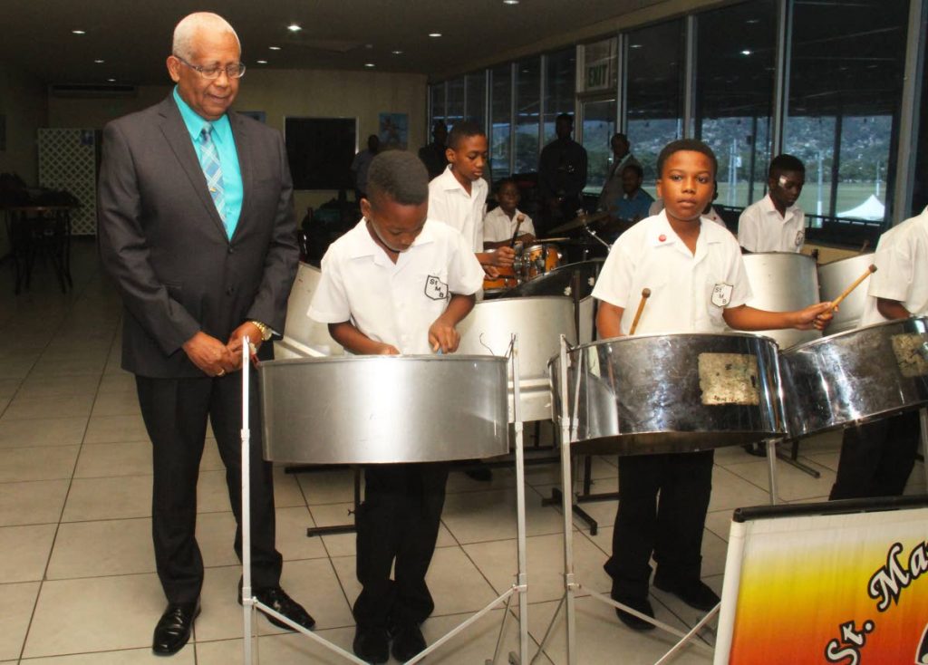 Education Minister Anthony Garcia takes in the performance of St Margaret’s Steel Orchestra at the launch of the 2019 Junior Panorama, VIP Lounge, Grand Stand, Queen’s Park Savannah, Port of Spain on Friday. PHOTO BY AYANNA KINSALE