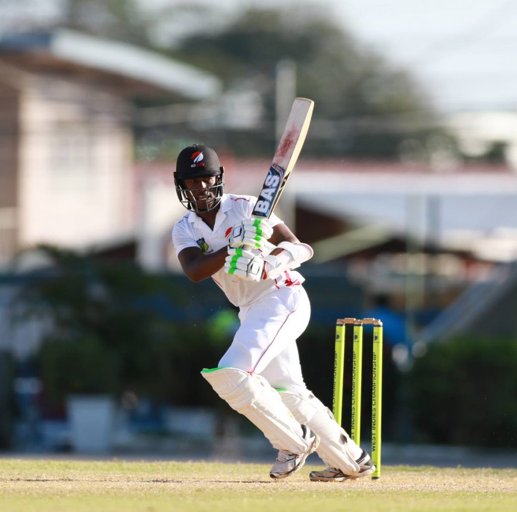 TT Red Force’s Jason Mohammed plays a shot during day 2 action of the West Indies regional 4 day match against the Guayana Jaguars at the Queens Park Oval,yesterday.
