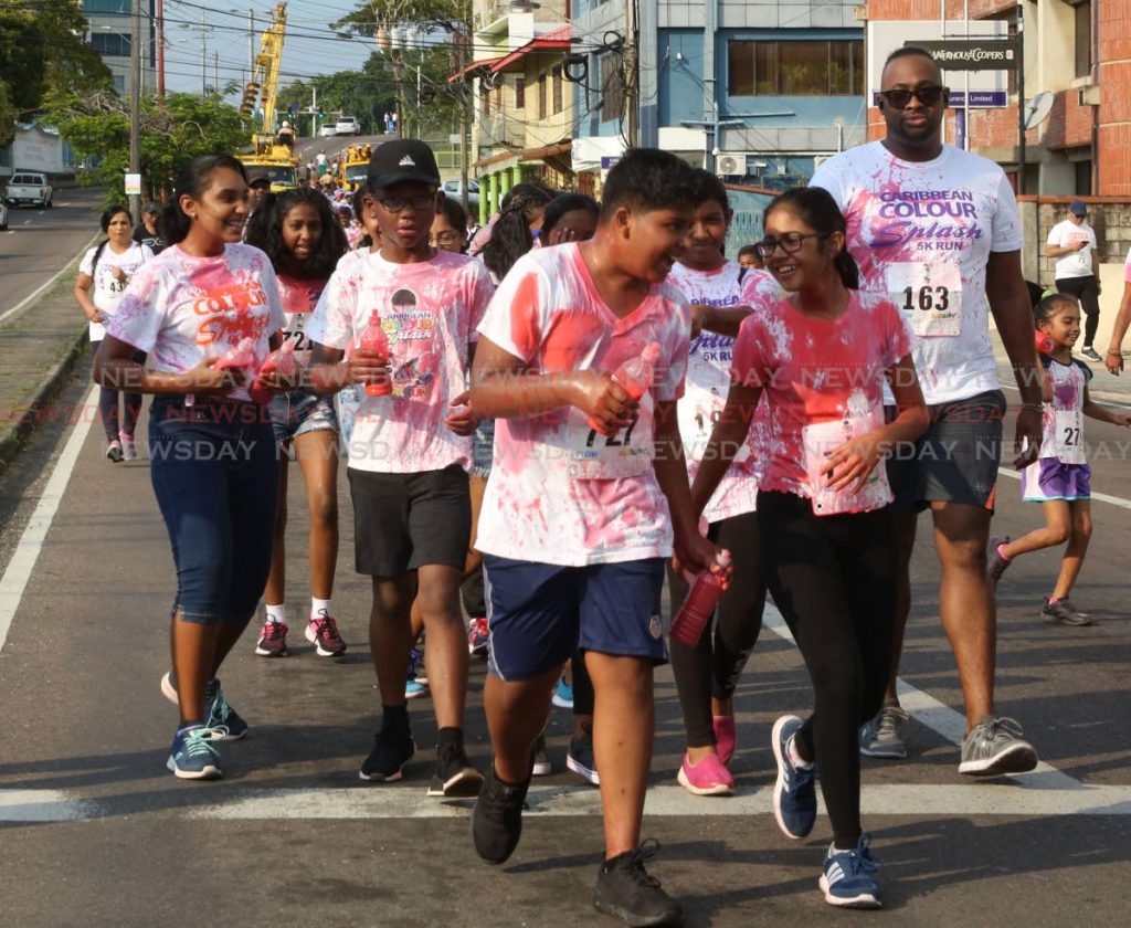Participants walking during the   Naparima Boys College ,  San Fernando ,  Caribbean  Colour  Splash 5k ,   held by the school this afternoon.  Photo by Vashti Singh