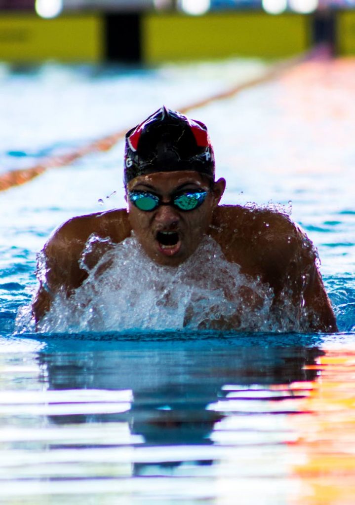 Josiah Parag competes in the breaststroke leg of the 15 and over 200m Individual Medley event at the Torpedoes 1st annual long course swimming competition held at the National Aquatic Centre, Balmain, Couva on Sunday. PHOTO BY MELANIE WAITHE