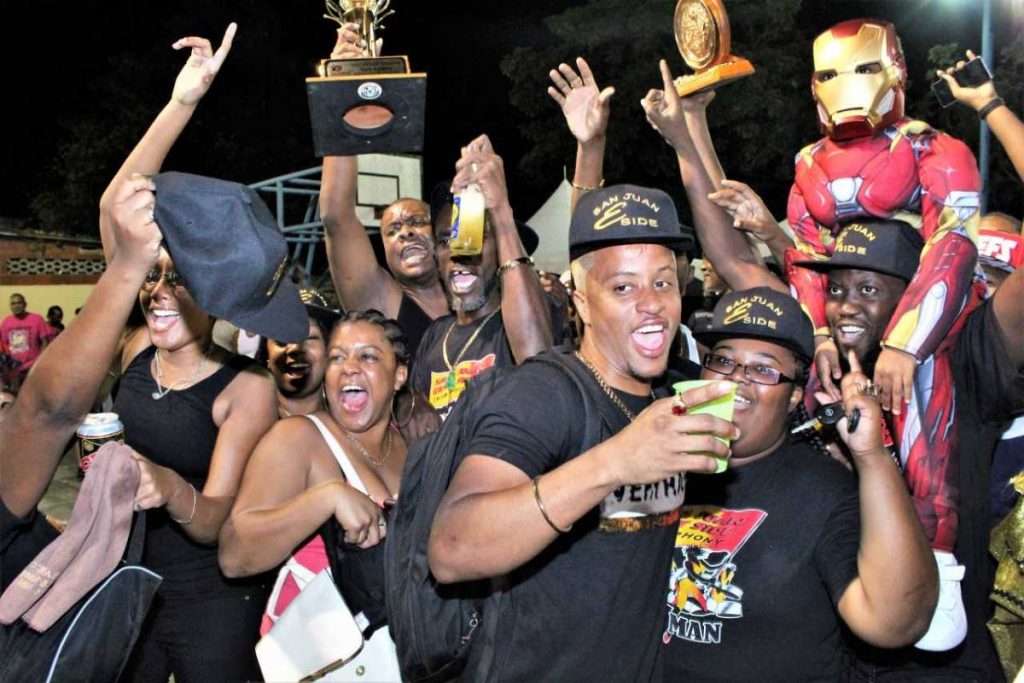 Members of San Juan East Side celebrate their victory in the Panorama single pan bands finals on February 5  in Arima. PHOTO BY GARY CARDINEZ