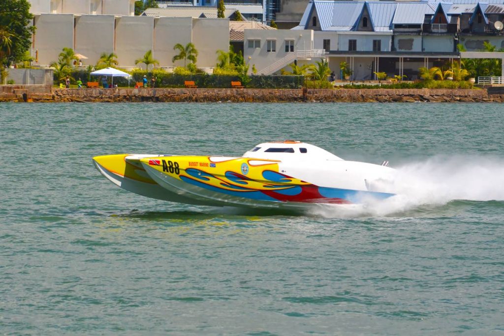 Driver James Hadeed and throttleman Guy Costa power Ironman to victory in the 130mph class at the first regatta of the NLCB National Championships Series at the TT Yacht Club, Chaguaramas on Sunday. PHOTO BY RONALD DANIEL